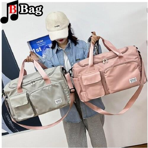 Travel bag women portable large capacity Handbag men waterproof portable short distance travel bag student luggage bag Satchel