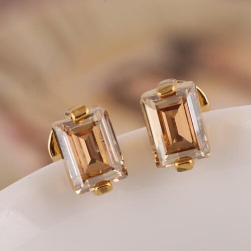 Inlaid with rectangular crystals, geometric stud earrings