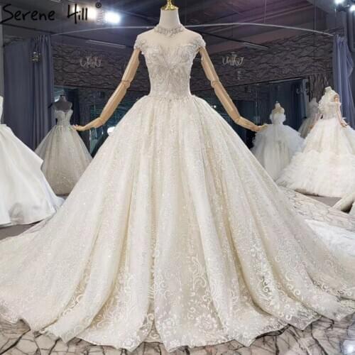 Ivory Sparkle Cap Sleeves Luxury Wedding Dresses 2020 Dubai Beading Diamond Sexy Bridal Gowns HX0218 Custom Made