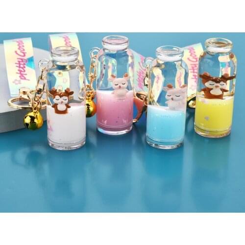 Creative Milk Elk Drifting Bottle Keychain Pendant Cartoon Doll Floating keyring for Women Couple Bag Keyfob Christmas Gifts
