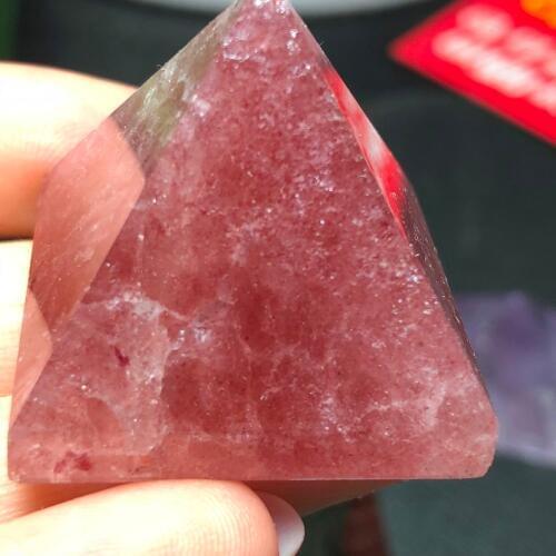 The high quality pure natural strawberry crystal pyramid can be used as a protection against evil and improve the environment