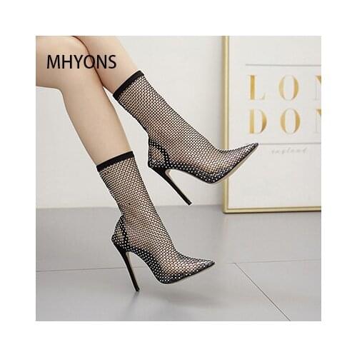 2021 Europe and the United States sexy black stiletto point toe hollow mesh fishnet socks boots ladies high heel ankle boots plu