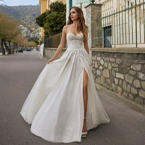 Glam Spaghetti Straps Beach Wedding Dress Boho vestido de noiva Side Split Lace Bridal Dress Appliques Glitter Wedding Gowns