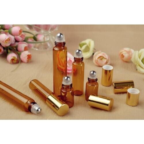 Free shipping 3ml/5ml 10pcs/lot brown glass steel ball roll on bottle,essential oil subpackage empty bottle with golden lid
