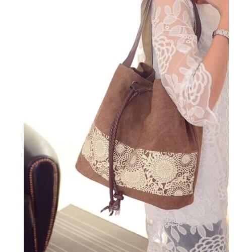 2021 New Womens shoulder bag the new national style canvas bag and retro printed bag are worn by the Sen womens department