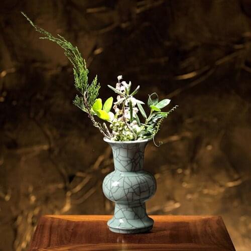 A Japanese zen art flower arranging elder brother kiln receptacle small teahouse stream ikebana porch place soft outfit