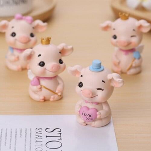 Shaking head crown piggy car ornaments car ornaments home shaking head doll ornaments car interior