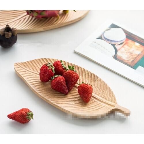 Solid wood tray black walnut whole wood fruit tray creative Japanese manual log carving leaf shaped wood tea tray
