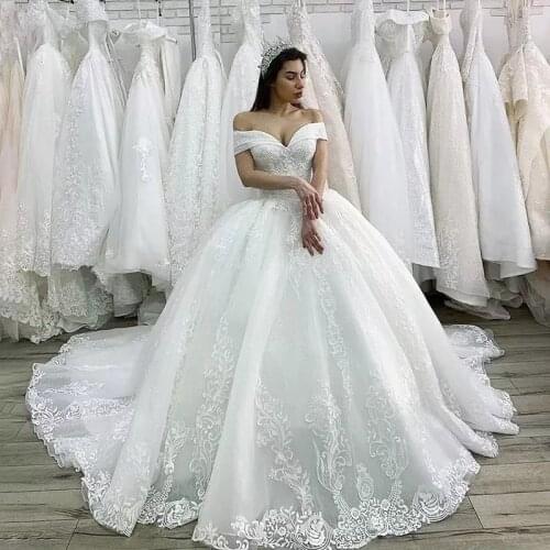Luxury Beaded Princess Wedding Dress 2021 Lace Appliques Lace up Ball Gown Illusion Bridal Customized Vestido de Noiva