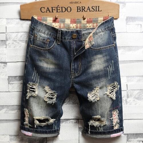 2021 summer new style mens washed retro ripped stitching short jeans ripped holes Slim trendy brand five-point pants mens deni