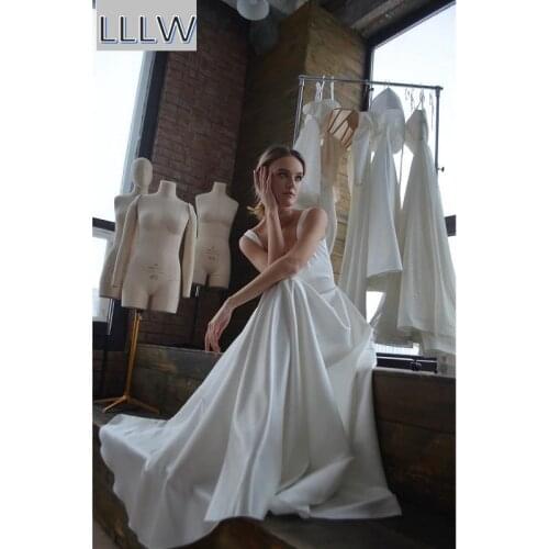 Ivory Satin Sleeveless Floor-Length Princess A-Line Wedding Dresses Chapel Train Custom Made Bridal Gowns