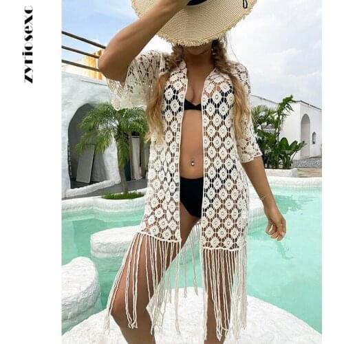 ZY 2021 Cross-border New Beach Bikini Blouse Hollow Crochet Knit Top Sexy Long Fringed Sunscreen Cardigan Beach Dresses Women