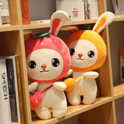 The cute fruit rabbit plush toy small white rabbit doll strawberry transformed into a backpack rabbit childrens gift