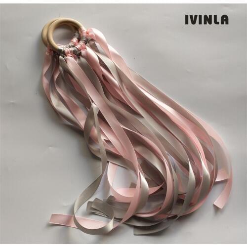 20pcs/lot pink and grey Wooden Ring Waldorf Ribbon With Bell Hand Kite Toy FLY ME Birthyday Party Favors