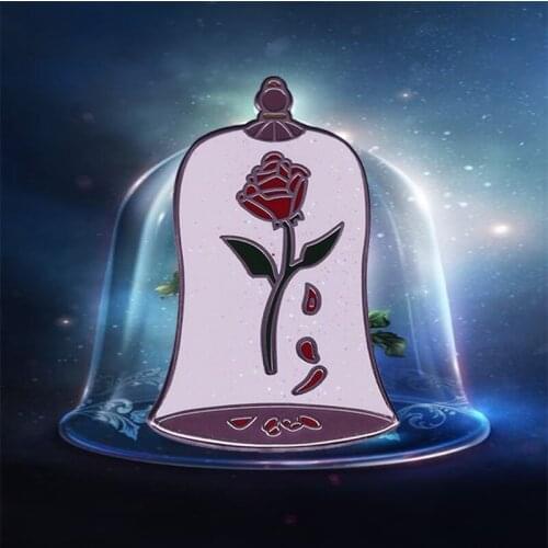 Bell Jar Rose Badge Romanticize the tale old as time with our Enchanted Rose 'snowglobe'' pin