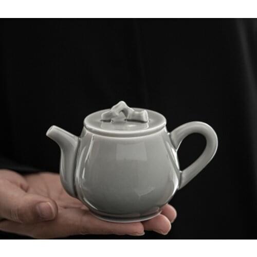 Japanese ceramic kung fu teapot single pot household Pu'er urgently needs a small hand-held pot