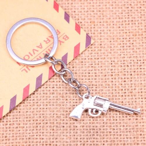 20pcs Fashion Keychain 35x15mm machine gun assault rifle Pendants DIY Men Jewelry Car Key Chain Ring Holder Souvenir For Gift