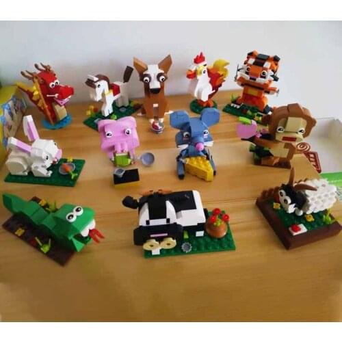 12PCS Chinese Zodiac Animal Building Block Mouse Tiger Cow Horse Monkey Dragon Mini Figures Bricks Model Toys For Children Gifts