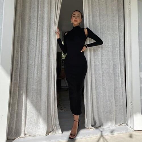 Free shipping 2020 new black and white long-sleeved backless dress rayon bandage High Street Woman dress and calf length dress