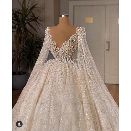 Luxury Ball Gown Pearls Wedding Dresses Lace Appliqued Beaded Sheer V Neck Dubai Arabia Bridal Gowns Vestidos De Novias
