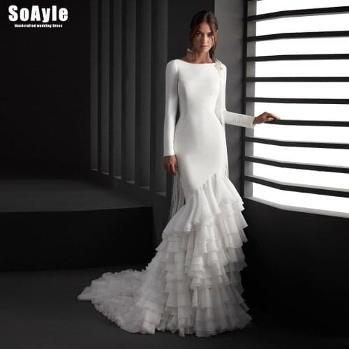 SoAyle Andalusian Air Wedding Dress Boat Neckline Long Sleeves with One Shoulder Crystal Tassel Spectacular Train Wedding Gown