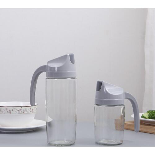 Creative new automatic opening and transparent dust-proof and closing oil bottle leak-proof kitchen multi-purpose
