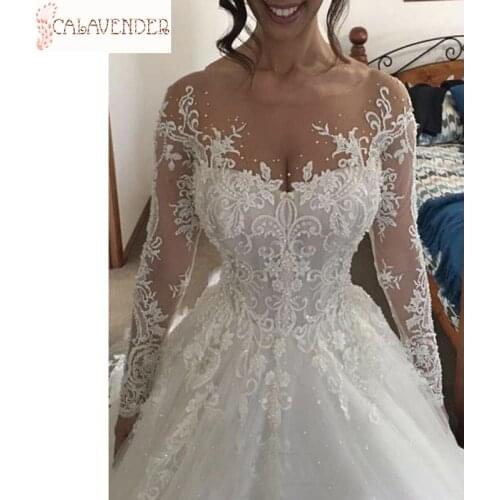Lace Wedding Dresses with Sleeves Ball Gown Illusion Neckline vestido de noiva Pearls Beaded Luxury Wedding Gowns