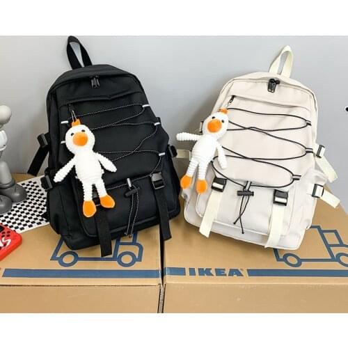 New Canvas Fashion Womens Backpack Cute Doll Pendant School Bag For Girls Large Capacity Light Travel School Backpack