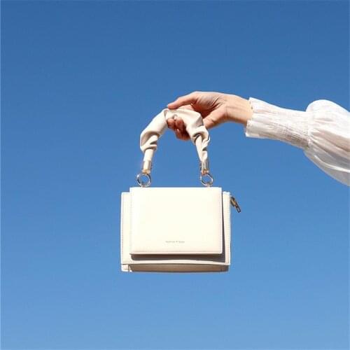 Reejim Women's White Bags