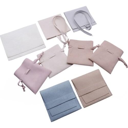 High Quality Treasure Packing Bag 1000Pcs Suede Jewelry Pouch Gift Sachet Bolsa Multi Size Elegant Pocket Can Customized Logo