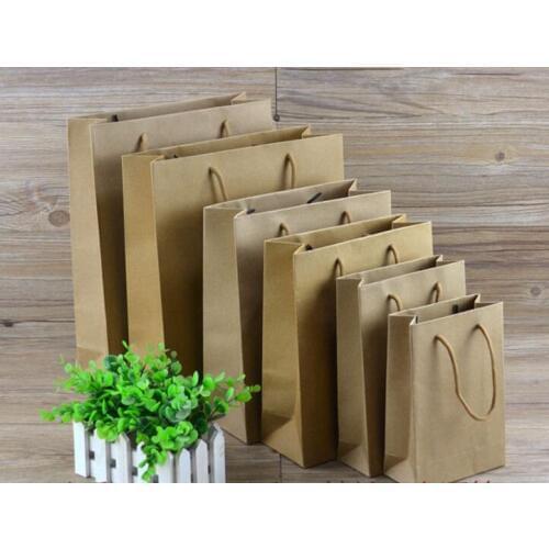 50pcs Wholesale Small Jewelry gift packaging paper shopping bag with handle paper gift bag for party paper bag with handle