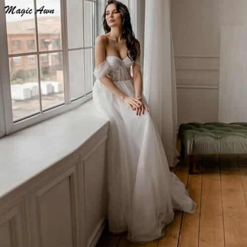 Magic Awn 2021 Off The Shoulder Boho Wedding Dresses Shiny Lace Appliques Illusion Wedding Party Gowns Sweep Train Beach Robes