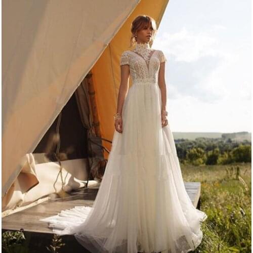 Backless Wedding Dresses A-line Short Sleeves Tulle Lace Boho Dubai Arabic Wedding Gown Bridal Dress Vestido De Noiva