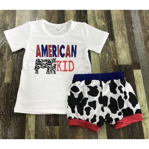 Children clothing Baby girl cute Independence Day American letters cow print white short sleeve top cow print buttock shorts set