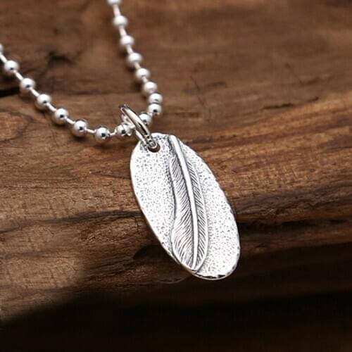 S925 sterling silver jewelry retro Thai silver men and women models handmade eagle skull flame feather pendant