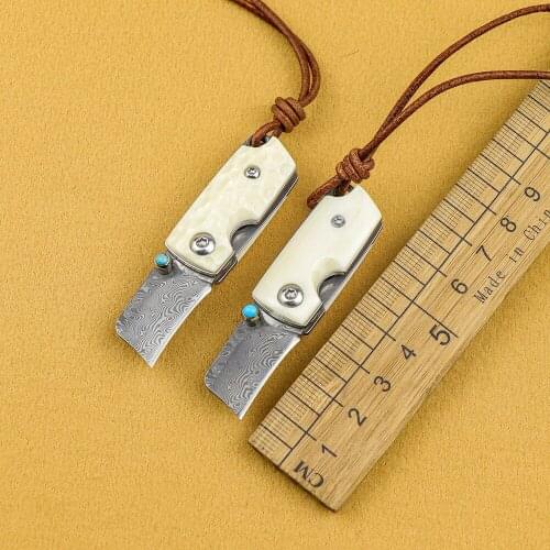 The Damascus steel, the cow bone handle, the pocket knife, the EDC, the pocket knife