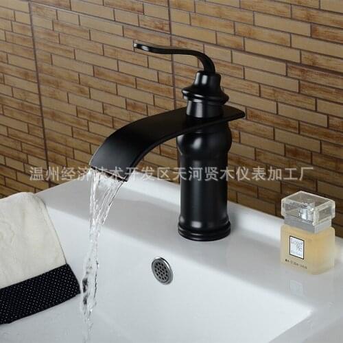 Black bronze waterfall antique wash basin faucet brass hot and cold under counter basin artistic personality faucet