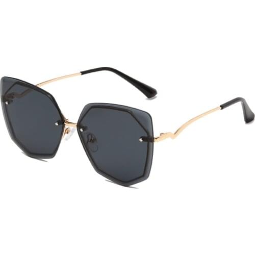 2021 New Luxury Fashion Sexy Cat Eye Sunglasses Women Rimless Wave Sun Glasses Metal Shades for Vintage Women Eyewear UV400