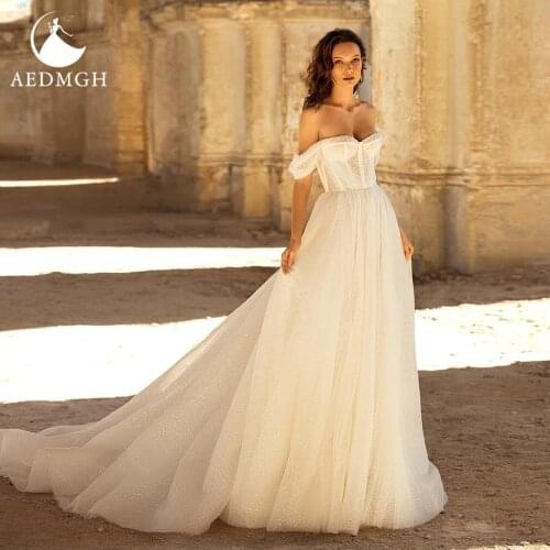 Aedmgh A-Line Beach Wedding Dresses 2021 Strapless Off The Shoulder Robe De Mariee Beading Crystal Shiny Boho Vestido De Novia