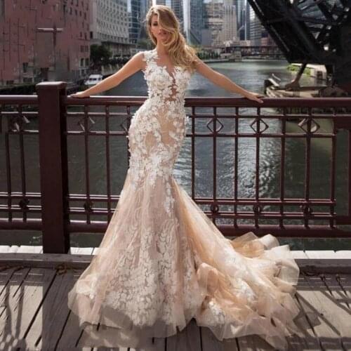 Mermaid wedding dress v-neck sleeveless luxury retro bridal dresses embroidery applique buttons on the back big skirt