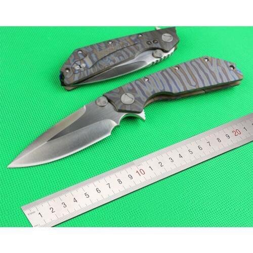 High-end folding knife The sharp d2 steel blade Handle TC4 titanium alloy + fire patterns Outdoor camping DEC tools