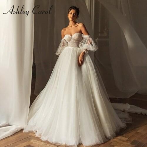 Ashley Carol A-Line Wedding Dress 2021 Charming Pleat Beaded Sweetheart Appliques Bride Puff Sleeve Backless Shining Bridal Gown