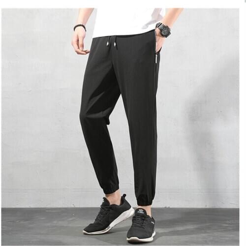 Quick-drying pants Men Cropped pants summer elastic force Loose Large size trend Slim fit black Little pants Mountain climbing
