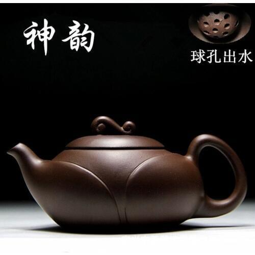 Manufacturers wholesale Yixing teapot original ore purple mud charm ball hole teapot 220 ml