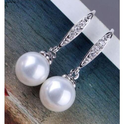 Unique natural round 10mm Australian south sea white pearl earrings