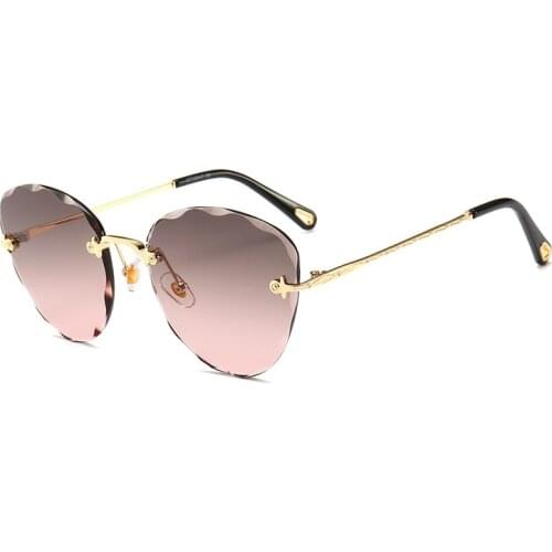 Rimless Ocean Sunglasses Womens Fashion Crystal Cut Sunglasses