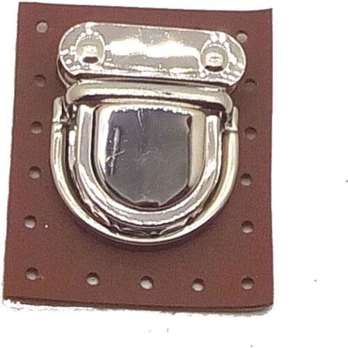 Silver color, tan faux-skinned lock