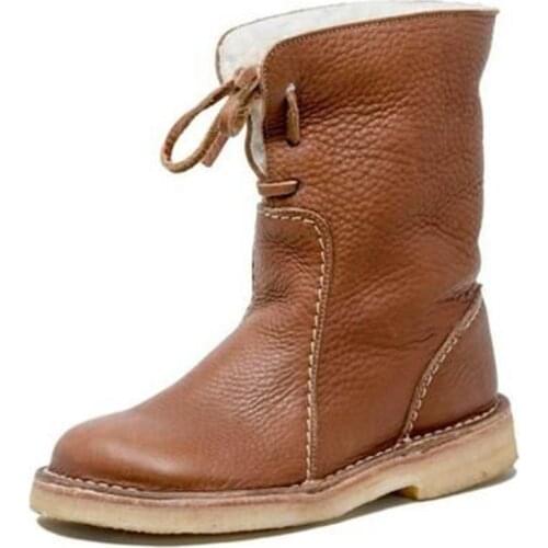 Large medium and low barrel snow boots womens low heel round head solid sleeve European and American Knight boots