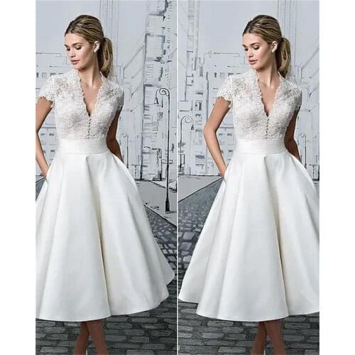 Summer New Style European and American Fashion Temperament White Lace Stitching V-neck Short-sleeved Party Dress