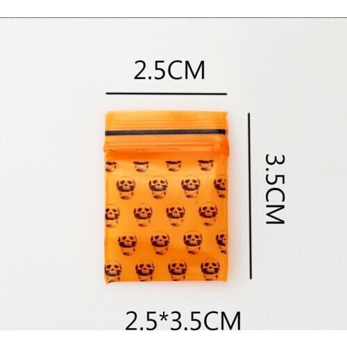 100pcs/lot 2.5x3.5cm / 0.98inch x1.38inch Orange Skull Small Ziplock jewelry bags Self sealing zip lock plastic bags PE Bags